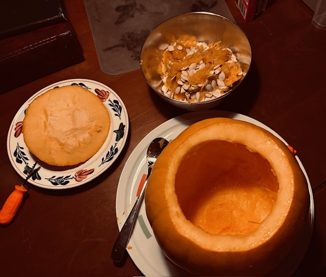 An empty scooped pumpkin, ready to be carved.
